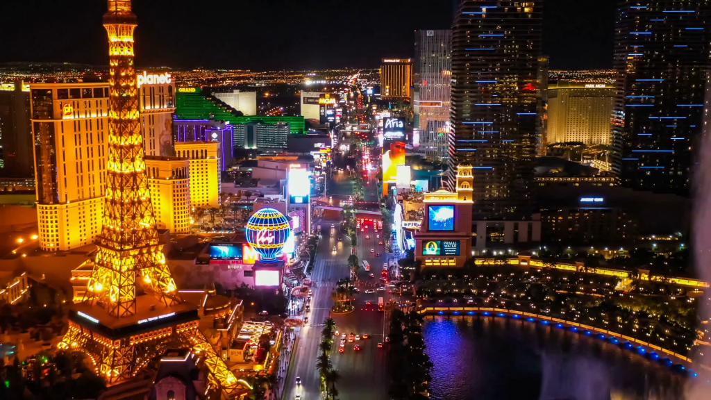 videoblocks-flying-over-downtown-las-vegas-at-night-with-a-view-of-hotels-along-the-strip_bpgay6-h3q_thumbnail-full01